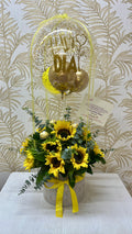 E-06   Arreglo en girasoles redondo con globo personalizado