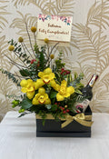 L-05   Jardinera con orquídeas y licor